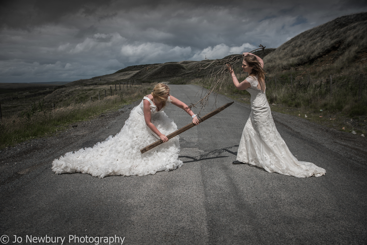 Jo Newbury Photography wedding two brides fighting fun shot