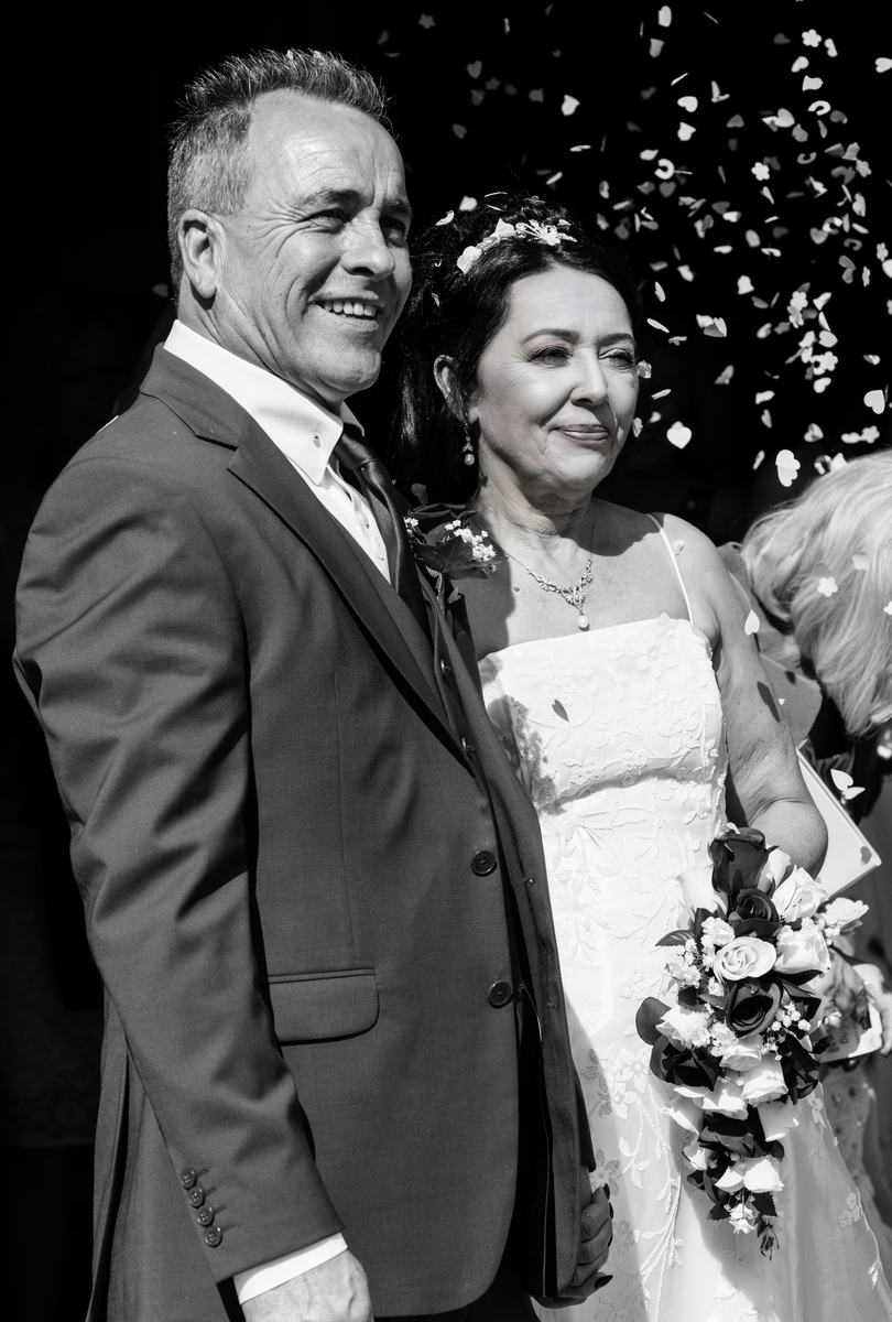 Jo Newbury Photography wedding bride and groom with confetti