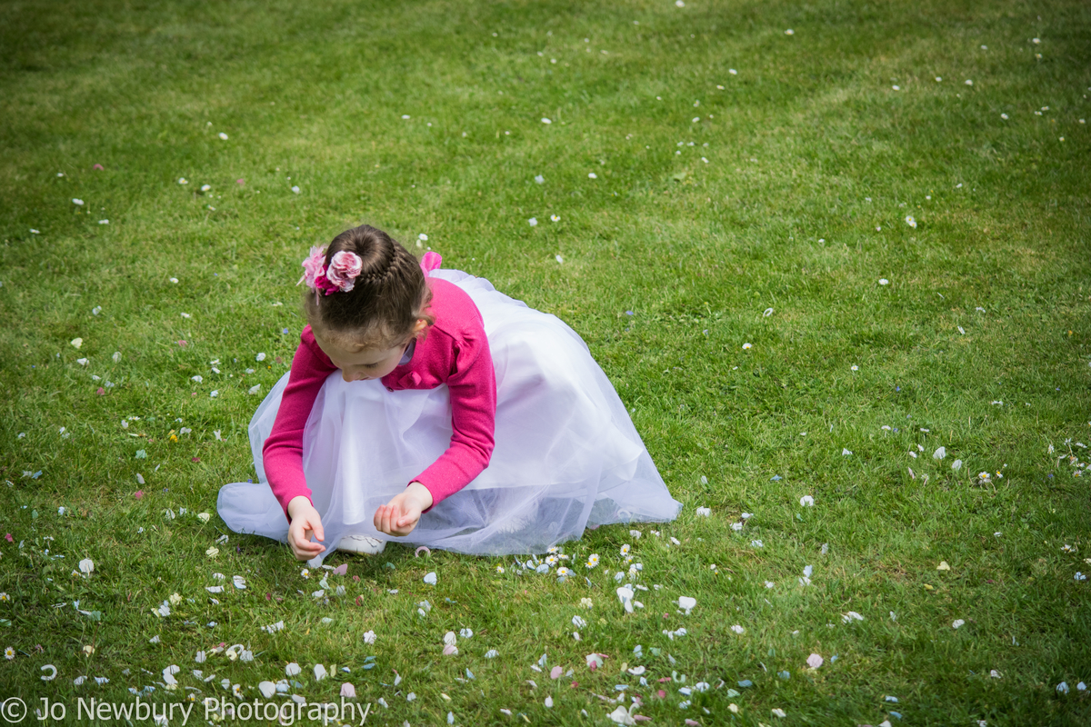 Jo Newbury Photography wedding bridesmaid picking flowers